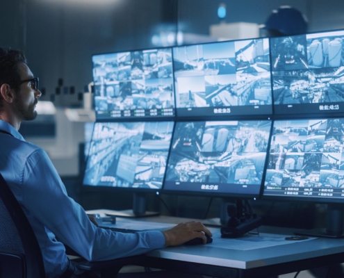 worker checking security feed